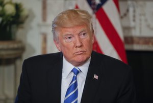 President Donald Trump listen to a reporter's question regarding the ongoing situation in North Korea at Trump National Golf Club in Bedminster, N.J., Friday, Aug. 11, 2017. (AP Photo/Pablo Martinez Monsivais)