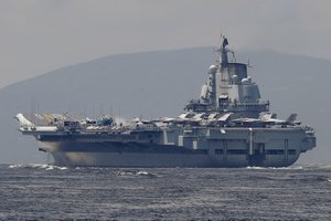 The Liaoning, China's first aircraft carrier, departs Hong Kong, Tuesday, July 11, 2017.