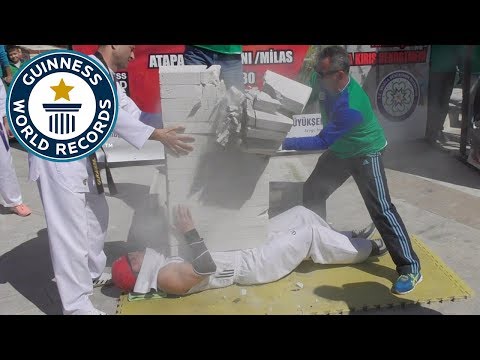 Fastest time to break 16 concrete blocks on the body - Guinness World Records