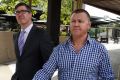 Former trade union boss Dave Hanna (centre) leaves the Magistrates Court during royal commission hearings.