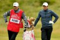 All over: McIlroy will have a new caddie on his bag at the World Golf Championships Bridgestone Invitational this week ...