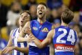 MELBOURNE, AUSTRALIA - JUNE 24: Matthew Suckling and Shane Biggs of the Bulldogs (right) celebrate during the 2017 AFL ...