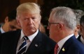 Australian Prime Minister Malcolm Turnbull walks with US President Donald Trump to the family photo during the G20 ...