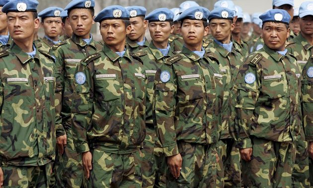 PLA soldiers prepare for a UN peacekeeping mission in Africa. Photo: EPA/Michael Reynolds