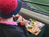 A Melbourne fan brought a cheese platter, including smashed avocado, to the AFL for the Demons vs Saints game. Source: Reddit user KrumDiddly