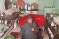 Frances Gabe in the kitchen of her self-cleaning house in Newberg, Oregon, in 2002. 