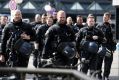 Riot police patrol ahead of the G20 in Hamburg.