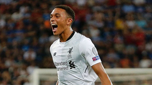 Liverpool's Trent Alexander-Arnold, left, celebrates his free kick.