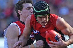 Playing it safe: Melbourne's Angus Brayshaw chose to wear a helmet for his AFL return.