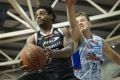 Melbourne United import Casper Ware goes to the basket against Adelaide last season.