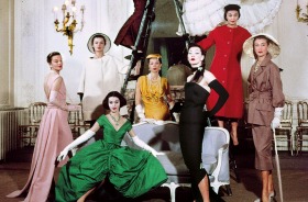 Models including Svetlana Lloyd, in green gown, show off a new collection in the 1950s at Dior's Avenue Montaigne store.