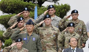 U.S. and South Korean soldiers salute during a change of command and change of responsibility ceremony for Deputy Commander of the South Korea-U.S. Combined Force Command at Yongsan Garrison, a U.S. military base, in Seoul, South Korea, Friday, Aug. 11, 2017.