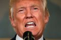 President Donald Trump speaks in the Diplomatic Reception Room of the White House in Washington, Monday, Aug. 14, 2017, ...