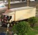 Authorities investigate a truck after it ploughed through Bastille Day revellers in the French resort city of Nice last July.