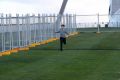 A temporary fence is installed at Parliament House in preparation for the building of a permanent security fence. 