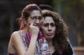 People flee from the scene after the van attack in the historic Las Ramblas district of Barcelona, Spain.