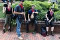 A group of Antifa activists rest during a rally in Charlottesville, Virginia. 