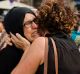 Families of young men believed responsible for the attacks in Barcelona and Cambrils gather along with members of the ...