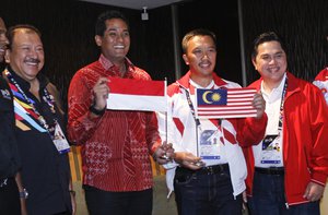 Malaysian Youth and Sports Minister Khairy Jamaluddin, second left, with Indonesian Youth And Sports Minister Imam Nahrawi, second right, posed for photograph after the press conference in Kuala Lumpur, Malaysia on Sunday, Aug. 20, 2017.