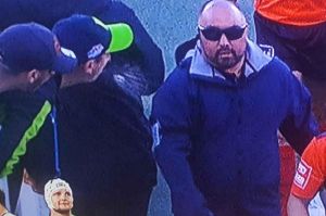 A Raiders fan appears to spit towards the officials at half-time in Sunday's game.