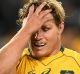 Tough night at the office: Michael Hooper reacts to another All Blacks try.