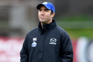 Brad Scott's coaching future is linked to the Kangaroos' bids to bring Josh Kelly or Dustin Martin to the club. 