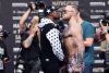 In this July 13, 2017, file photo, Floyd Mayweather Jr., left, and Conor McGregor, of Ireland, face each other for ...