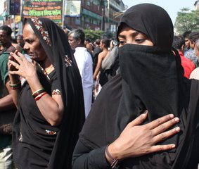 Indian Shiite Muslim Women as they take part in Muharram Procession in Kolkata, India, Sunday, Nov. 25, 2012