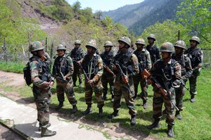 A group of Indian army soldiers is being briefed by their officer before patrolling a volatile area on Line Of Control on April 20, 2015 in Gohalan, 120 Kms (75 miles) north west of Srinagar , the summer capital of Indian administered Kashmir, India. People living along the ceasefire line dividing Kashmir into India and Pakistan-administered portions have continually been at risk due to hostility between the armies of the two nuclear rivals. India on Sunday alledged a ceasefire violation by Pakistan along what New Delhi prefers to call the International Border and Working Boundary by Islamabad, snaking the southern Jammu region of the disputed area. The Indian army in northern Uri district say it has increased its vigil along the Line of Control (LOC), another military line that further divides the region up to the Siachen glaciers. Both Pakistan and India have traded blame over unprovoked shelling which India says is aimed to facilitate the crossover of rebels to their side, a charge Pakistan denies.