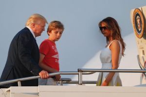 President Donald Trump, first lady Melania Trump and son Barron Trump board Air Force One at Morristown Municipal ...