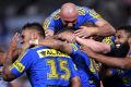 Back to winning ways: Parramatta Eels players celebrate one of their five tries on Thursday.