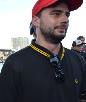 Protesters sporting a Fred Perry polo that they've adopted as their signature garment.