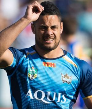 Jarryd Hayne (left) and Leivaha Pulu of the Titans warm up before the Round 23 NRL match between the St George-Illawarra ...