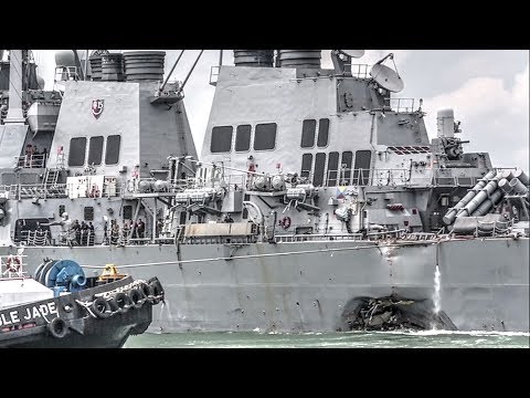 US Navy Ship USS John S. McCain Limps Into Singapore Naval Base After Collision