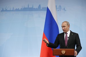 Russian President Vladimir Putin speaks during a press conference after the G-20 summit in Hamburg, northern Germany, Saturday, July 8, 2017, where the leaders of the group of 20 met for two days.