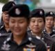 Police officers deploy outside the Thai Supreme Court ahead of ascheduled  verdict on charges accusing former Prime ...