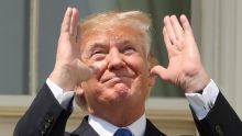 Trump fails to use eclipse glasses