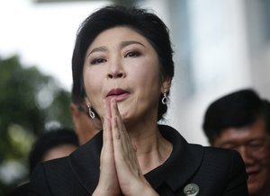 In this Friday, July 21, 2017, Former Thailand's Prime Minister Yingluck Shinawatra arrives at the Supreme Court for last day of the hearing in Bangkok Thailand,  Thailand’s military government has seized assets of its latest elected prime minister _ Yingluck Shinawatra _ in an attempt to recoup damages of over a billion dollars for a failed rice subsidy program her administration introduced.