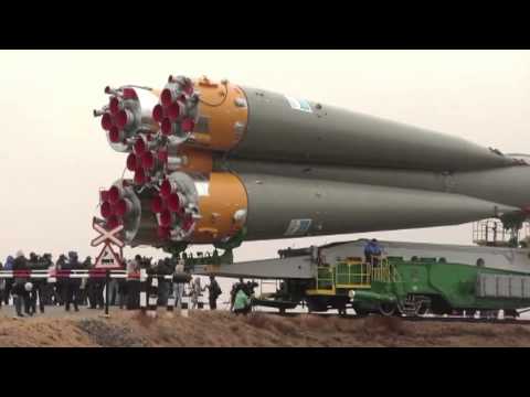 Expedition 27 Crew Prepares for Launch as their Soyuz Rocket Move to Launch Pad