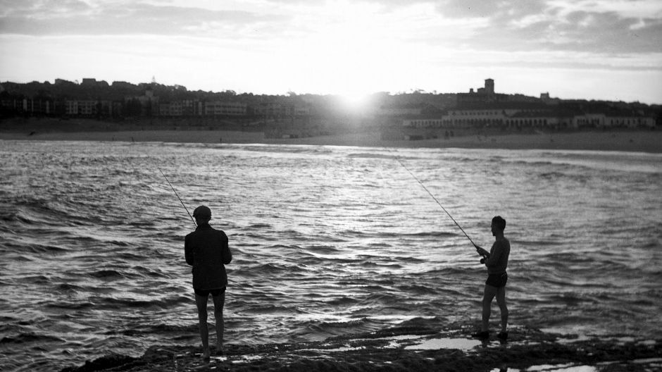 Fishing at sunset on Sydney's Bondi Beach in 1936. SMH NEWS Picture by STAFF Fishermen 1930s Australia dusk east ...