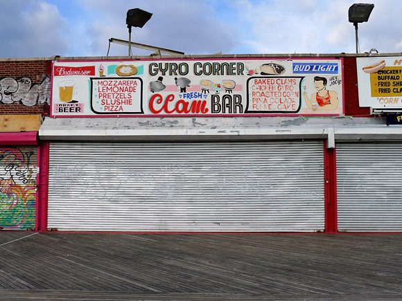 Coney Island and Brighton beach, southern Brooklyn, New York, United States with photos of the boardwalks, amusement park, pier, funfair rides, shopfronts and beach