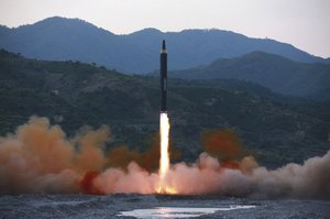 This May 14, 2017, file photo distributed by the North Korean government shows the "Hwasong-12," a new type of ballistic missile at an undisclosed location in North Korea.