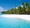 The breathtakingly beautiful turquoise lagoons and white sand beaches of Aitutaki Lagoon, Cook Islands.