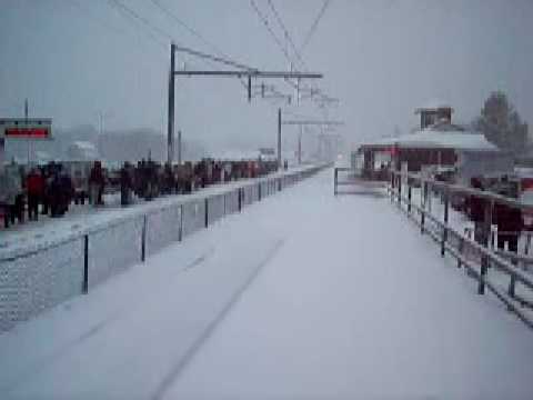 MUST SEE!! Acela with tons and tons of horn flying through the snow