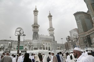 Muslim pilgrims make their way at the Grand Mosque in the Muslim holy city of Mecca, Saudi Arabia, Friday, Sept. 9, 2016. Muslim pilgrims have begun arriving at the holiest sites in Islam ahead of the annual hajj pilgrimage.