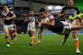 Escape act: Latrell Mitchell scores the match-winner in the 74th minute