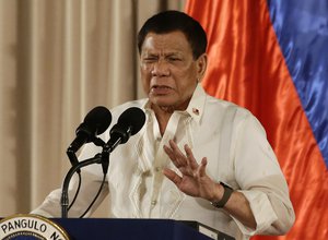 In this Aug. 16 photo, Philippine President Rodrigo Duterte gestures during the 19th Founding Anniversary of the Volunteers Against Crime and Corruption at the Malacanang Presidential Palace in Manila, Philippines.