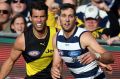 Alex Rance of the Tigers (left) and Harry Taylor of the Cats will face off again in two weeks time. 