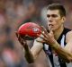 Mason Cox was not giving anything away in regards to his AFL future.