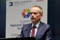Bill Shorten explains his trusts policy at the Vodafone National Small Business Summit last week. 
